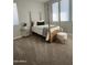 Bedroom with wood post bed, carpet flooring, and neutral walls at 39190 N Kaden Ln, San Tan Valley, AZ 85140