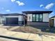Modern single story home with a two-car garage and neutral color scheme at 39190 N Kaden Ln, San Tan Valley, AZ 85140