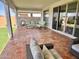 Spacious patio with comfortable seating and backyard access at 39190 N Kaden Ln, San Tan Valley, AZ 85140