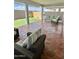Relaxing patio with seating area and terracotta tile flooring at 39190 N Kaden Ln, San Tan Valley, AZ 85140