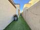 Artificial turf backyard with string lights at 3937 S 79Th Ln, Phoenix, AZ 85043