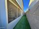 Artificial turf backyard and screened patio at 3937 S 79Th Ln, Phoenix, AZ 85043