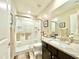 Clean bathroom with shower and granite vanity at 3937 S 79Th Ln, Phoenix, AZ 85043