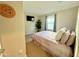 Bright bedroom with a double bed and window at 3937 S 79Th Ln, Phoenix, AZ 85043