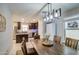 Welcoming dining area adjacent to the kitchen, perfect for Gathering meals at 3937 S 79Th Ln, Phoenix, AZ 85043