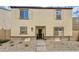 Inviting two-story home featuring a well-maintained facade and a tidy, minimalist front yard at 3937 S 79Th Ln, Phoenix, AZ 85043