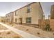 Two-story home with a low maintenance yard and neutral exterior paint at 3937 S 79Th Ln, Phoenix, AZ 85043
