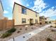 Two-story house with light-beige exterior, landscaping, and a welcoming front entrance at 3937 S 79Th Ln, Phoenix, AZ 85043