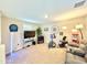 Game room with TV, exercise bike, and dartboard at 3937 S 79Th Ln, Phoenix, AZ 85043
