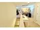 Spacious loft area with seating and game equipment at 3937 S 79Th Ln, Phoenix, AZ 85043