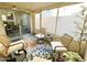 Screened patio with comfortable seating at 3937 S 79Th Ln, Phoenix, AZ 85043