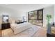 Bright Main bedroom with a large window and a beautiful rug at 5000 N Camelback Ridge Dr # 107, Scottsdale, AZ 85251