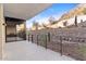 Private patio with mountain views and stone wall at 5000 N Camelback Ridge Dr # 107, Scottsdale, AZ 85251