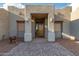 Inviting home entrance with a decorative brick walkway and stylish exterior lighting at 5465 N Winchester Rd, Apache Junction, AZ 85119