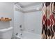 Clean bathroom with a tub shower and patterned curtain at 625 S Westwood -- # 102, Mesa, AZ 85210