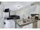 Kitchen with granite countertops, stainless steel appliances, and breakfast bar at 625 S Westwood -- # 102, Mesa, AZ 85210