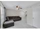 Living room with gray sectional sofa and tile floors at 625 S Westwood -- # 102, Mesa, AZ 85210