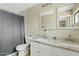 Updated bathroom with double vanity and granite countertop at 730 W El Alba Way, Chandler, AZ 85225