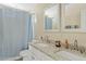 Bathroom boasts a double vanity with granite countertop at 730 W El Alba Way, Chandler, AZ 85225