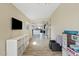 Long hallway view offering a glimpse into the kitchen and living areas at 730 W El Alba Way, Chandler, AZ 85225