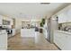 Kitchen with stainless steel appliances and white cabinets at 730 W El Alba Way, Chandler, AZ 85225