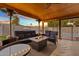Relaxing patio with wicker furniture and fire pit at 730 W El Alba Way, Chandler, AZ 85225