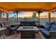 Cozy patio features fire pit and comfortable seating at 730 W El Alba Way, Chandler, AZ 85225