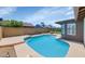 Backyard features include a refreshing pool and covered patio area at 7331 W Aster Dr, Peoria, AZ 85381