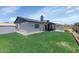 Lush green backyard with refreshing pool and covered patio, great for outdoor entertaining at 7331 W Aster Dr, Peoria, AZ 85381