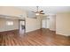 Spacious living area with wood floors, vaulted ceiling, neutral paint, and lots of natural light at 7331 W Aster Dr, Peoria, AZ 85381
