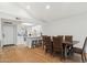 Dining room with a large wooden table and chairs, near kitchen at 7359 E Valley View Rd, Scottsdale, AZ 85250