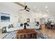 Light and airy living room with hardwood floors, vaulted ceiling and comfortable seating at 7359 E Valley View Rd, Scottsdale, AZ 85250
