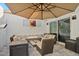 Relaxing patio with fire pit and comfortable seating at 7359 E Valley View Rd, Scottsdale, AZ 85250