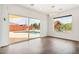 Dining room with sliding doors opening to a view of the pool at 7725 E Portland St, Scottsdale, AZ 85257