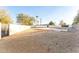 Large fenced-in backyard offering desert landscaping and a secure perimeter at 7860 E Davenport Dr, Scottsdale, AZ 85260