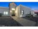 Stunning front entrance featuring stone accents and a paved walkway, exuding curb appeal at 7860 E Davenport Dr, Scottsdale, AZ 85260