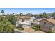 Upscale community featuring well-maintained homes, lush landscaping and picturesque water views at 10120 E Topaz Dr, Scottsdale, AZ 85258
