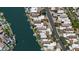Overhead aerial of waterfront homes showcasing the neighborhood's layout and water access at 10120 E Topaz Dr, Scottsdale, AZ 85258