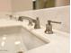 Close-up of bathroom sink and modern faucet fixture at 10120 E Topaz Dr, Scottsdale, AZ 85258