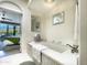 Elegant bathroom featuring a tub, light countertops, hexagon-tiled floors, and views of a cozy bedroom at 10120 E Topaz Dr, Scottsdale, AZ 85258