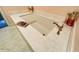 Relaxing bathroom featuring a freestanding bathtub and hexagonal tile flooring at 10120 E Topaz Dr, Scottsdale, AZ 85258