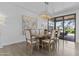 Dining room with view to backyard through sliding glass doors at 10120 E Topaz Dr, Scottsdale, AZ 85258