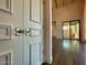 Modern white double doors with silver hardware at 10120 E Topaz Dr, Scottsdale, AZ 85258