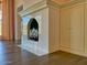 Elegant fireplace with marble surround and built-in cabinetry at 10120 E Topaz Dr, Scottsdale, AZ 85258