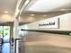 Close-up of a stainless steel KitchenAid refrigerator in a well-lit kitchen at 10120 E Topaz Dr, Scottsdale, AZ 85258