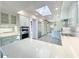 Modern kitchen with white cabinets and quartz countertops at 10120 E Topaz Dr, Scottsdale, AZ 85258