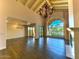 Bright and spacious living area with hardwood floors and a fireplace at 10120 E Topaz Dr, Scottsdale, AZ 85258