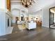 Spacious living room with high ceilings, fireplace, and open floor plan at 10120 E Topaz Dr, Scottsdale, AZ 85258
