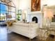 Elegant living room showcasing a large window and comfortable seating arrangement at 10120 E Topaz Dr, Scottsdale, AZ 85258