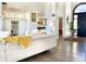 Bright living room featuring hardwood floors, a fireplace, and a modern white sofa at 10120 E Topaz Dr, Scottsdale, AZ 85258